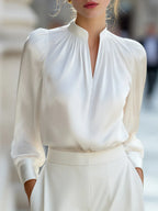Blusa de satén con manga abullonada Greta en blanco